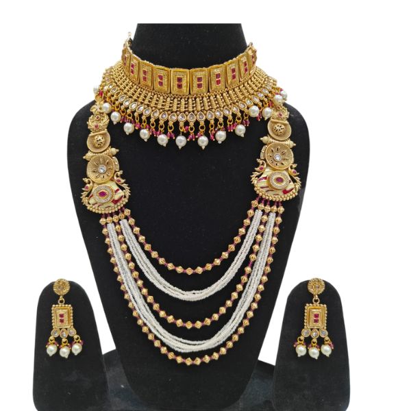 🔹 Key Features: Material: Premium alloy with antique gold finish Design: Traditional South Indian temple jewelry Embellishments: Pearl drops, red stones, kundan work Set Includes: 1 Choker, 1 Long Necklace, 1 Pair of Earrings Ideal for: Brides, Wedding Guests, Festivals, Ceremonies